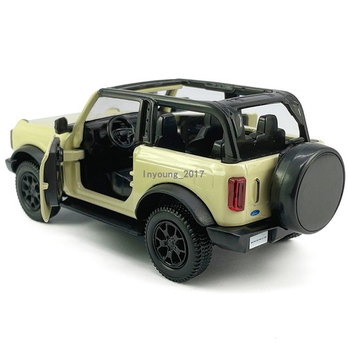 1:36 Ford Bronco Model Car Metal Diecast Toy Vehicle Doors Open Pull Back Beige - Picture 4 of 11