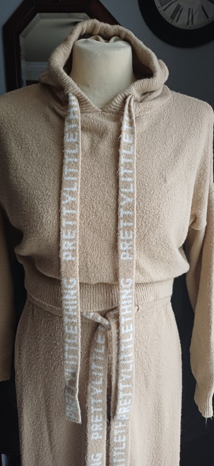 beige-prettylittlething-hooded-knit-set-features-prominent-logo