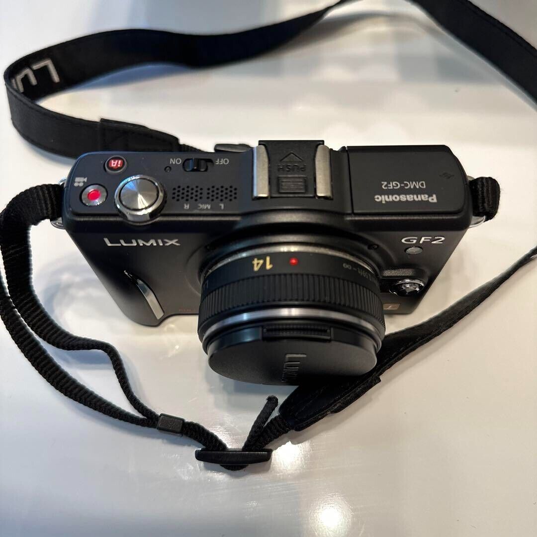 Panasonic LUMIX DMC-GF2 W/ 14mm lens 14-42mm lens Black Panasonic LUMIX DMC-GF2 W/ 14mm lens 14-42mm lens Black