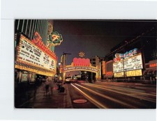 Postcard Famous Reno Arch at Night Reno Nevada USA