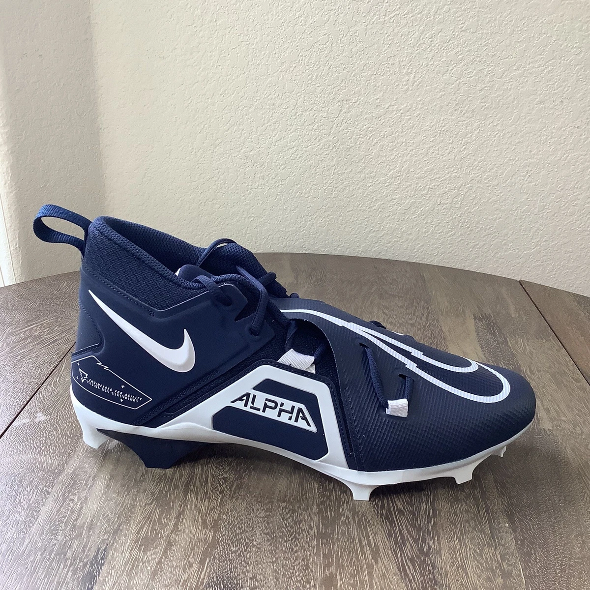 Navy blue top nike football cleats