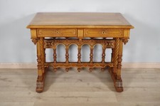 Bureau Renaissance en noyer sculpté et doré, signé Dufin, vers 1880