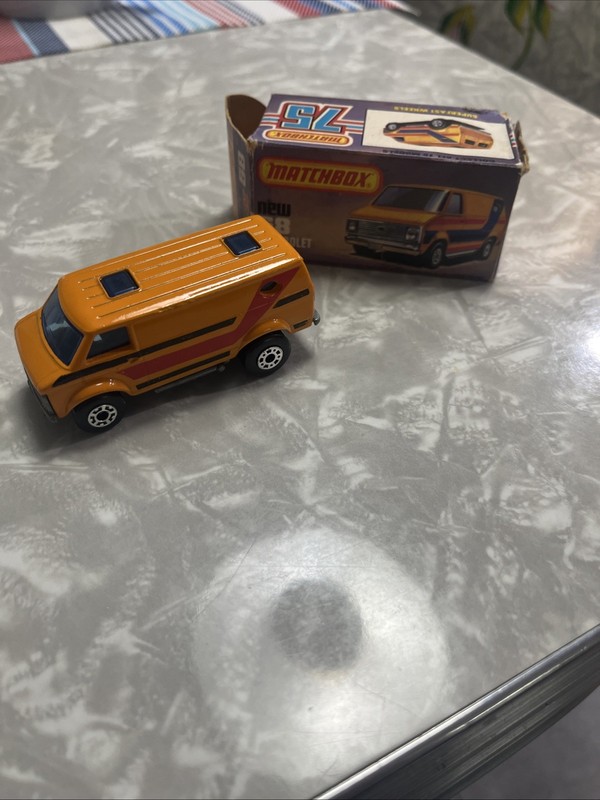 A94 1:64 3 INCH MATCHBOX SUPERFAST 68 CHEVROLET VAN ORANGE NMIB