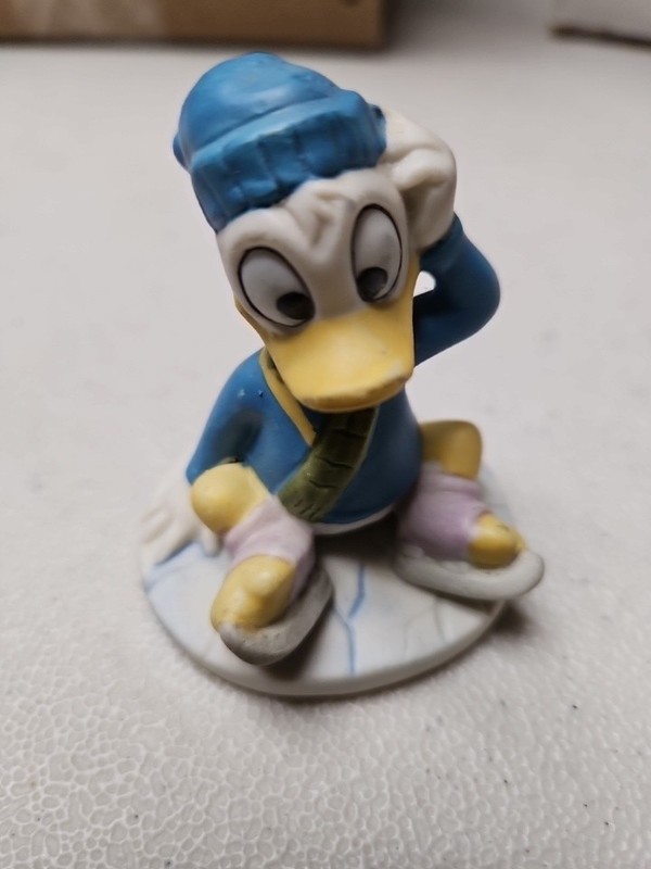 Vintage Disney Small Donald Duck Ice Skating  1988 Pocelain Figure