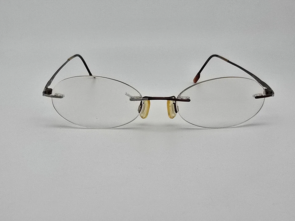 Marco de gafas Nikon 0815 marrón bronce titanio sin montura con estuche 48-17-140 Foto 2 de 4