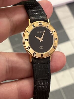 Gucci 27 3000 665 Ladies Watch 18k Gold Plate Roman Numerals Black