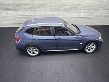BMW X1 E84, 1:18 Scale Die-Cast Mode Blue , Kyosho  Mirror Damage No Box