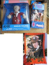 2 AC/DC Angus Young Items a Silk Flag from Italy and a Blown Ups Figure