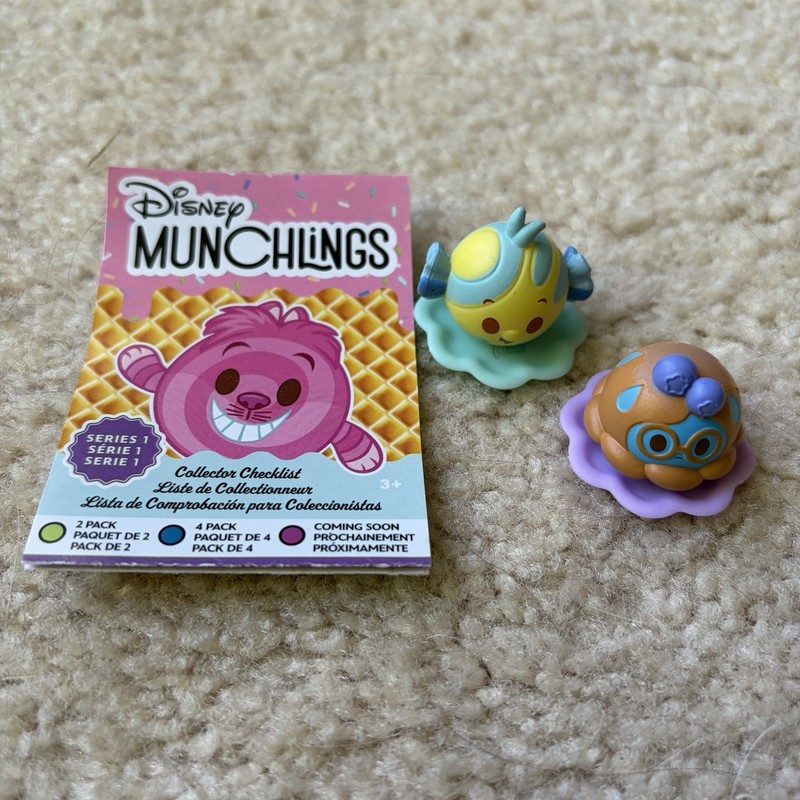Disney Munchlings Series 1: Banana Berry Candy Flounder & Blueberry Pie Sadness