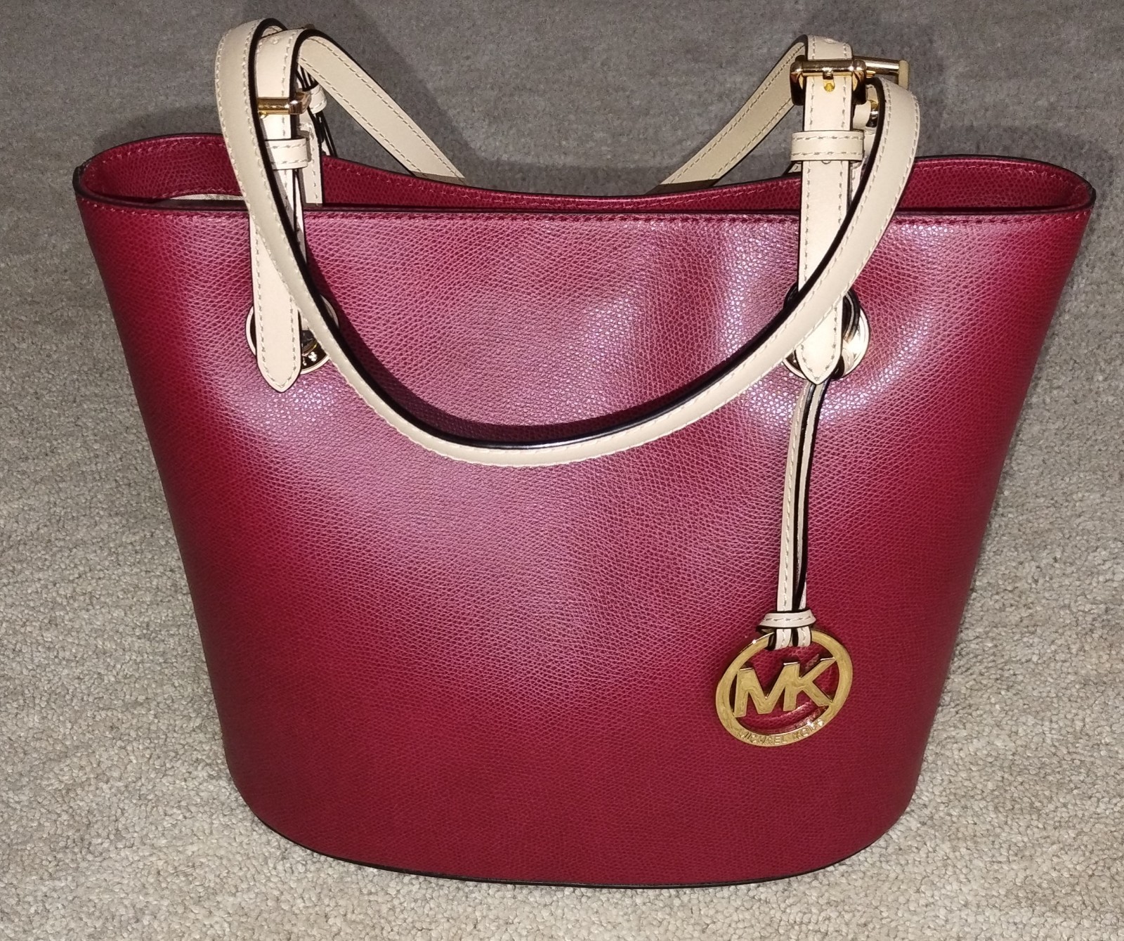Michael Kors Raspberry / Burgundy Jet Set Tote Handbag with Oval Bottom. NWOT.