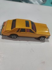 Hot Wheels Vintage Cadillac Seville Gold Hong Kong Nm