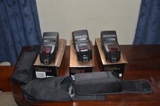 3 Yongnuo Speedlites. 2 YN-568 EX and 1, 560 IV Shoe Mount Flash for Nikon