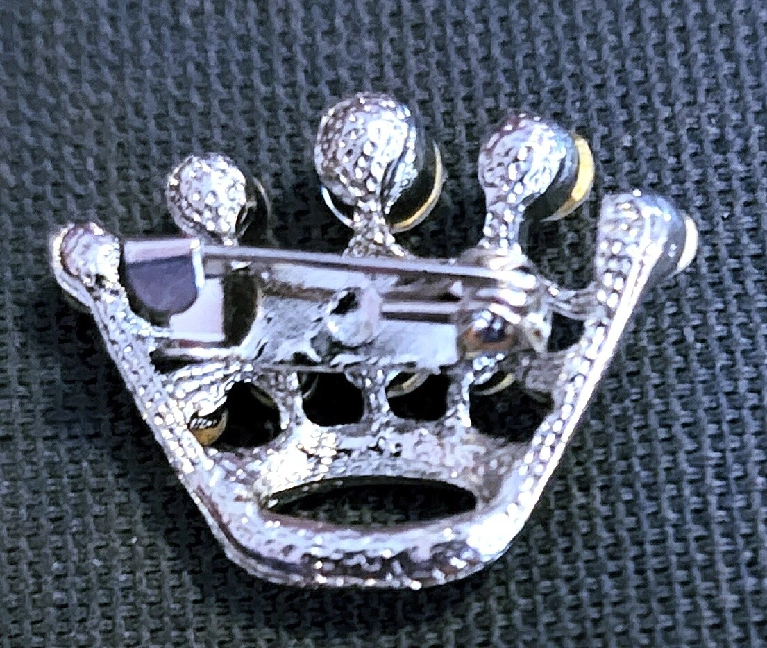 Crown brooch best sale pin