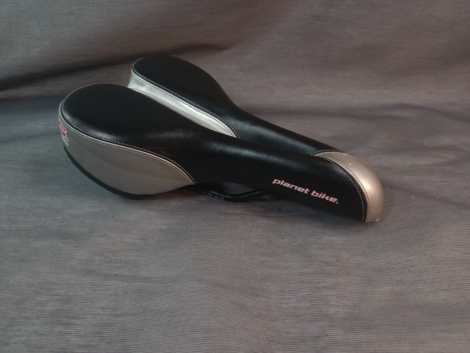 Planet Bike A.R.S. Classic Deep Groove Comfort Foam Bicycle Saddle in Silver