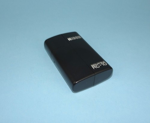 Telecomando per fotocamera Ricoh RC-10. Con scatola con istruzioni e batterie. - Foto 7 di 12