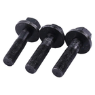 Three black hexagon-threaded blade bolts with worn metal finish, standing upright against a plain white background.