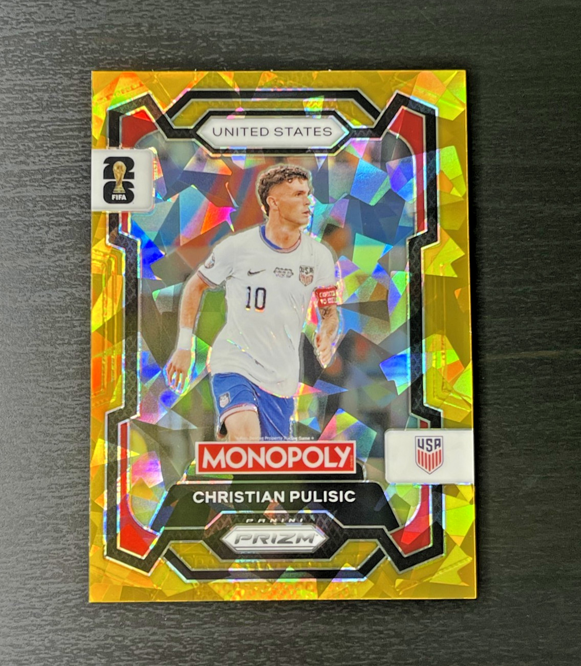 2026 Panini Prizm Monopoly Christian Pulisic FIFA World Cup Gold Cracked Ice USA