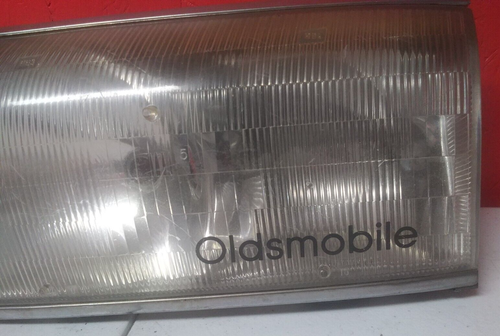1991 - 1993 Oldsmobile 98 Ninety Eight Touring Sedan LH driver headlight w/logo - Picture 2 of 5