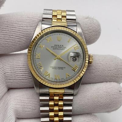 Rolex Datejust 36mm Steel 18K Yellow Gold Silver Roman Dial Mens