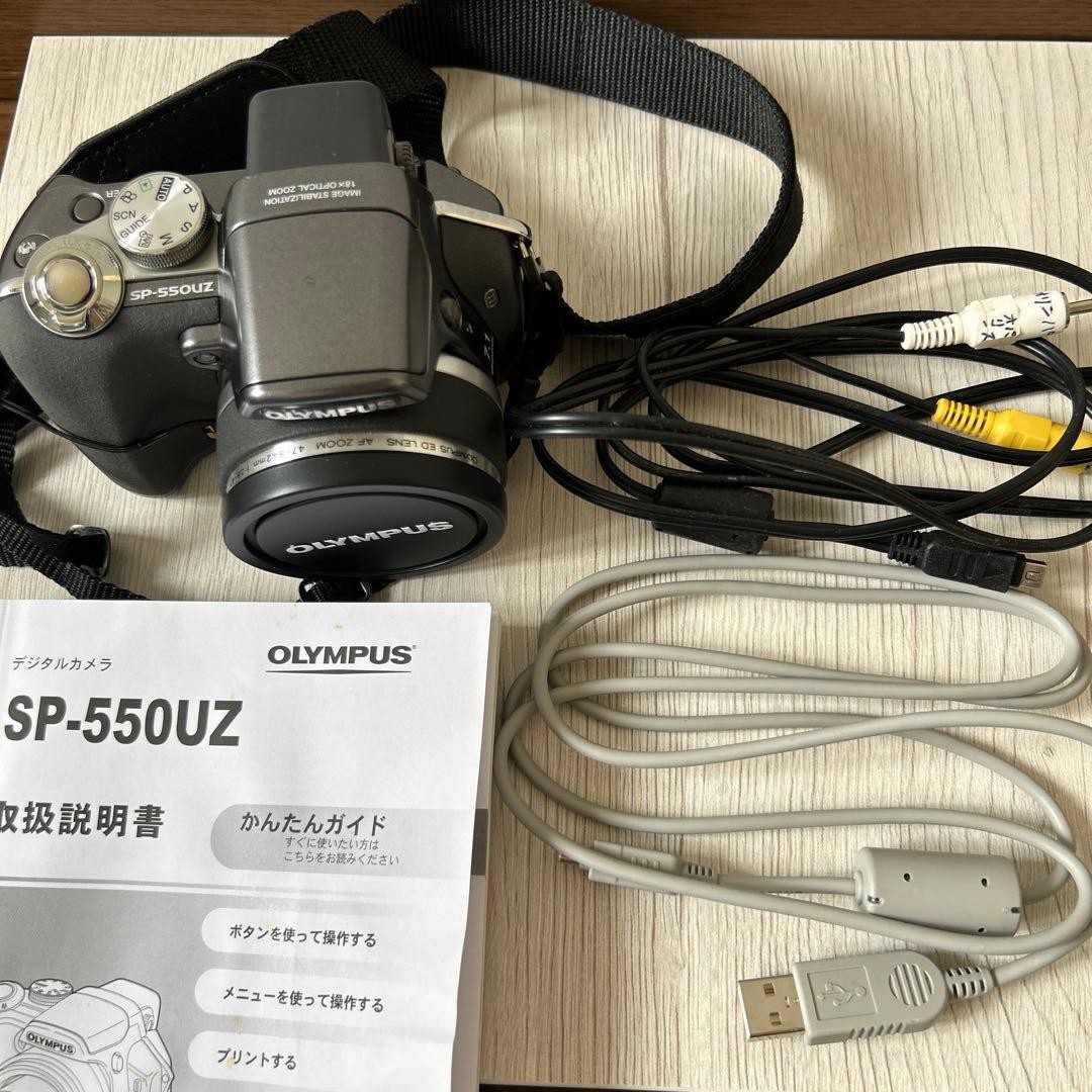 OLYMPUS SP-550UZ Compact Digital Camera 18x Optical Zoom Seller OLYMPUS SP-550UZ Compact Digital Camera 18x Optical Zoom Seller