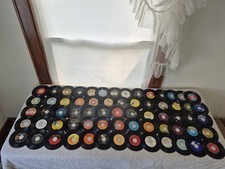 Mixed lot of vintage 7 inch 45 RPM vinyl records spanning rock, soul, Motown