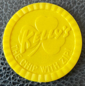 Vintage KELLY'S POTATO CHIPNICKS "The Chip With Zip!" Plastic Token 1971 Yellow