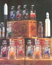 12 GALAXY SPACE FOODS SPACEMAN  ASTRONAUT SODA SYRUP BOTTLE COIN BANKS 1953