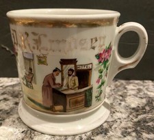  EARLY OCCUPATIONAL SHAVING MUG HOTEL LOBBY SCENE CLERK VISITOR MAN READING WOW 