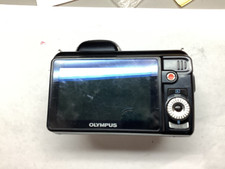 OLYMPUS SP-810UZ - Point  Shoot Digital Camera Read