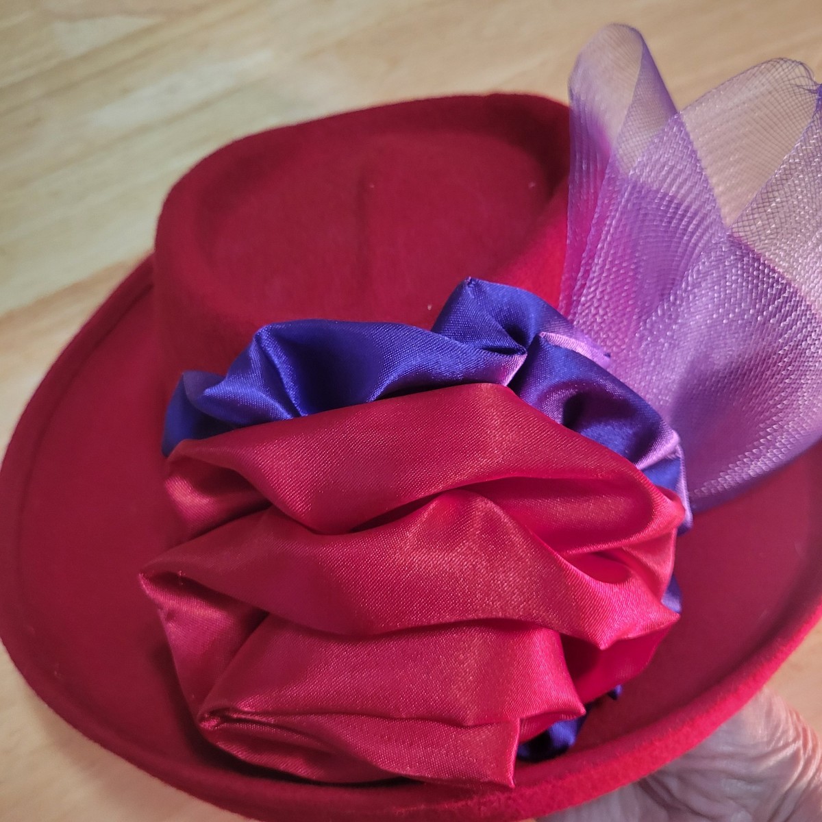 red dress purple hat Today is a Red Hat Society gathering day so red hat it is with my purple attire. For some reason the color looks different but it is red