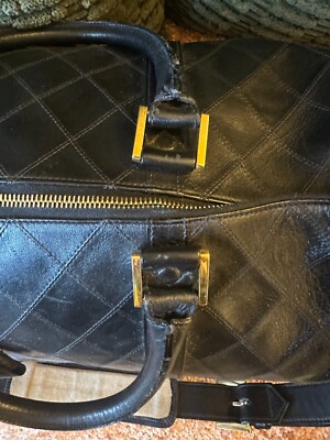 Authentic Chanel Black Quilted Lambskin Boston Duffle Bag with
