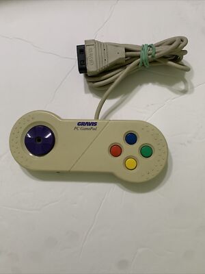 Gravis PC GamePad. Connects to PC controller port.