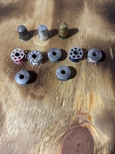 3 Vintage Metal Thimbles And 7 Vintage Metal Bobbins