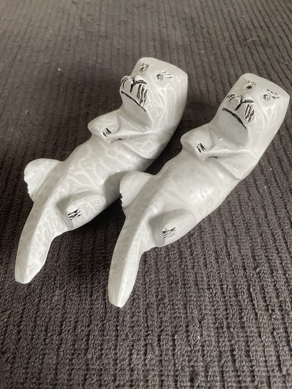 Two Handmade Cement Otter Figurines