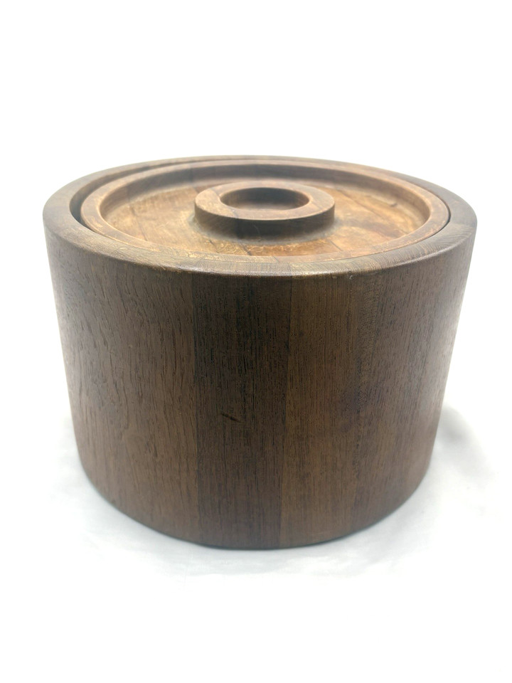 Classic Dansk staved teak ice bucket by Quistgaard — the quintessential MCM bar object with serious collector cred.