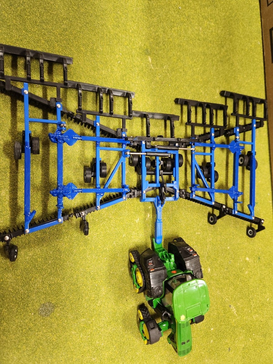 1/64 ERTL NEW HOLLAND CUSTOM 55' TURBO DISK ,4- WING FOLDING W