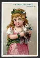 Victorian Trading Card - Niagara Starch - "Girl Holding Kitten"  (5I8)