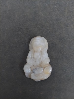 Pendant - stone carved into a Buddha