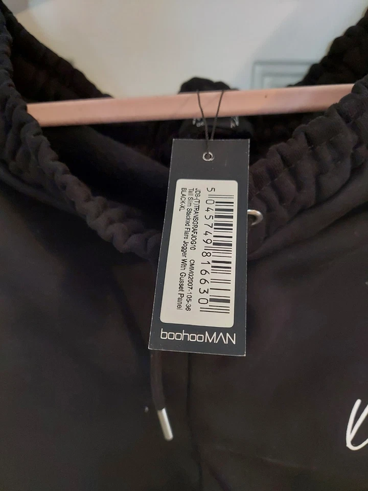 Pantalones deportivos XL negros con blancos para hombre Foto 3 de 4