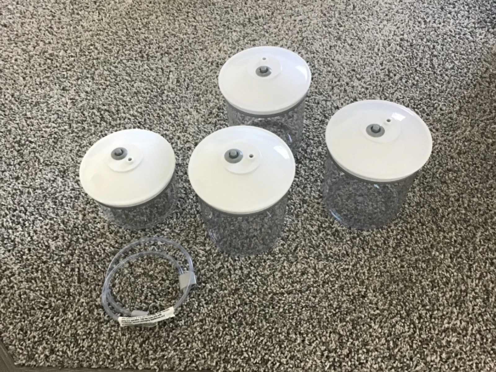 Set of 4 Foodsaver Snail Containers with Sealing Tube, 25 oz & 50 oz