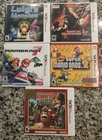 Nintendo 3DS Game Lot Resident Evil, Luigi Mansion, Mario Kart 7, Super Mario 2