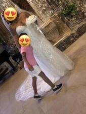 Wedding Dress with A Beautiful White Feather Design Worn Once Shorter Then 2h