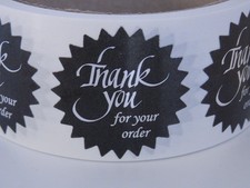 Thank You For Your Order Label 1.5" Starburst silver letters black bkgd  250/rl