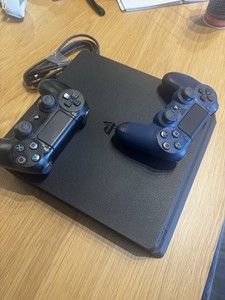 Sony PlayStation 4 Slim  Black Console Bundle w/ 2 DualShock 4 Controllers