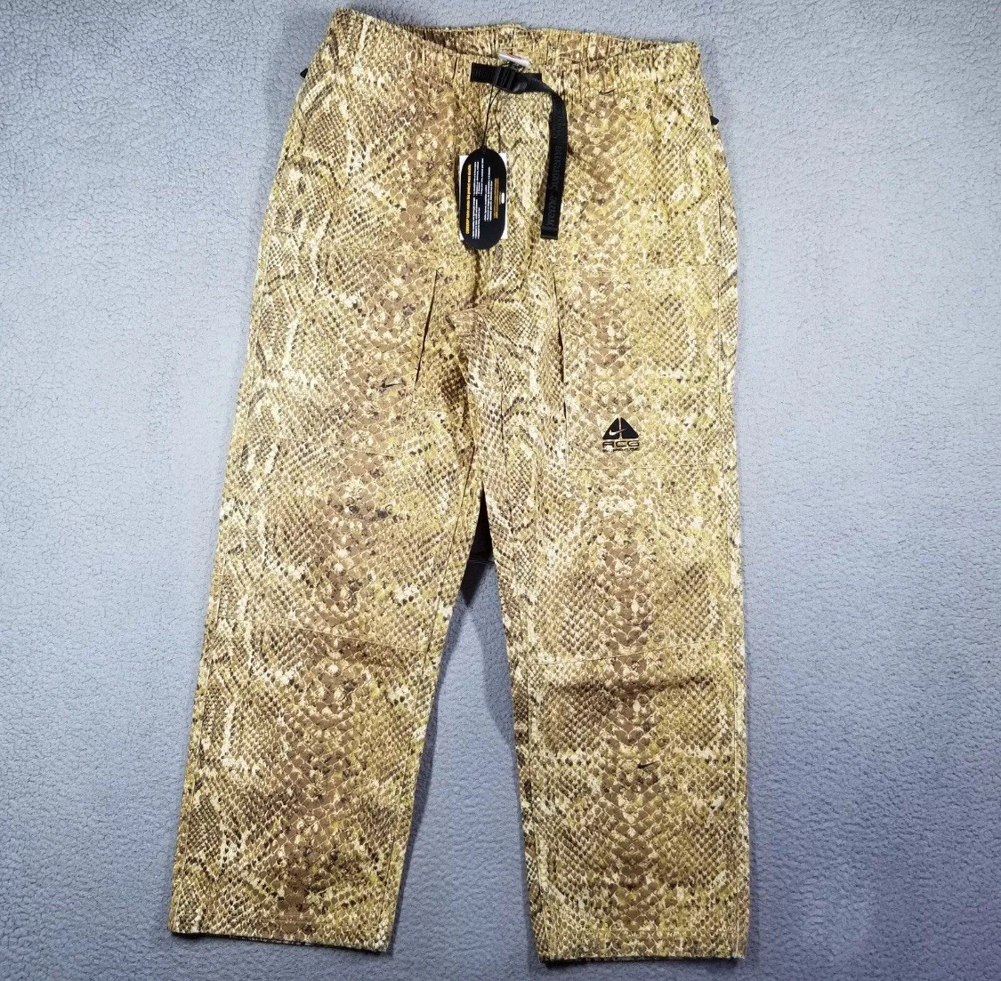 Supreme X Nike ACG pantalon en denim ceinturé hommes grand jean doré peau de serpent DN3251 777