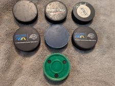 7 Used Ice Hockey Pucks - NHL - Green Biscuit - Kings Official Signed Puck