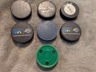 7 Used Ice Hockey Pucks - NHL - Green Biscuit - Kings Official Signed Puck