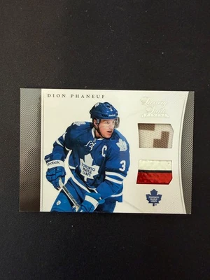 2012-13 Panini Luxury Suite Dion Phaneuf Dual Jersey Stick Patch #7 - Image 1 of 2