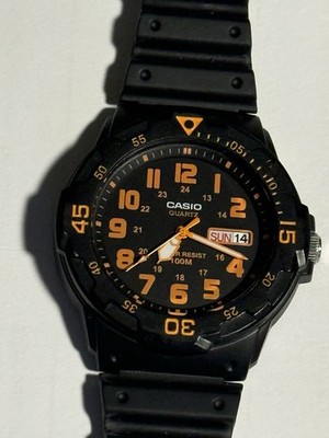 Casio MRW-200H Men's Quartz Wristwatch Day/Date Display Orange Indices.