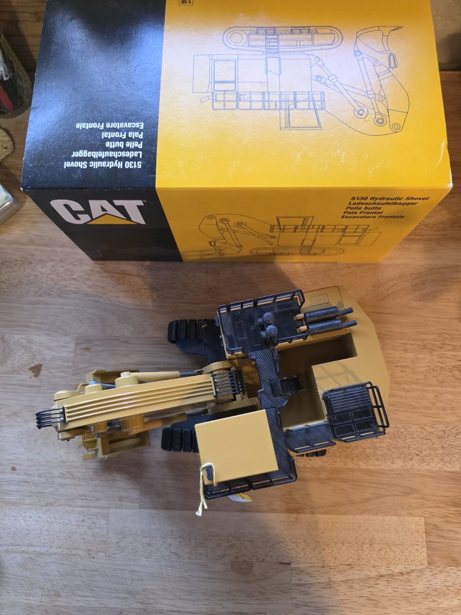 NZG 1/50 – Pelle Hydraulique CAT 5130 – Engin De Chantier – 25 Cm – Occasion (Défaut Peinture)